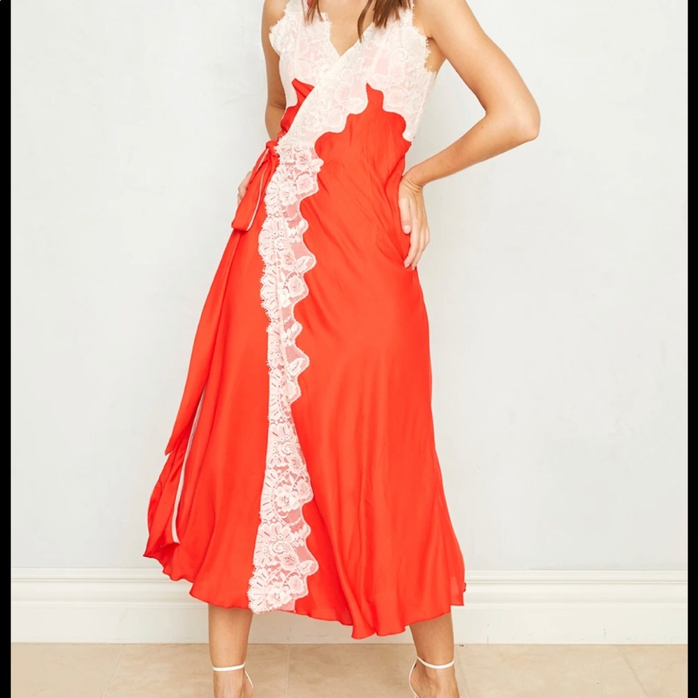 We are HAH Dancing Queen Dress. NWT.
